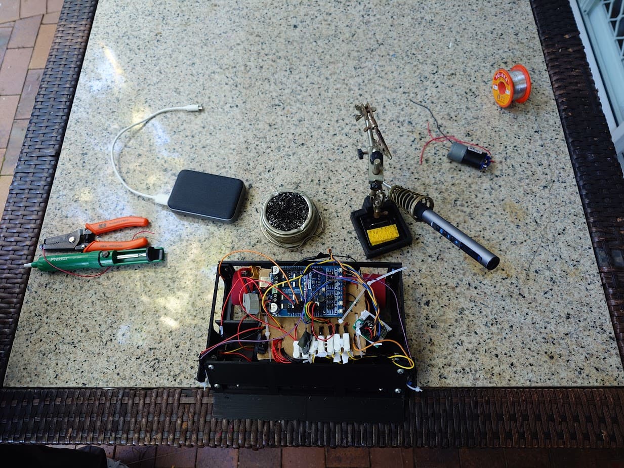 Working on the last iteration of our sumo bot in Australia